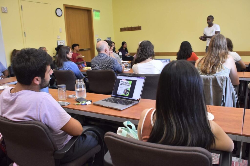 Travis Stewart speaks at Wesleyan.